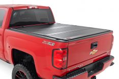 Rough Country 49119651 Hard Tri-Fold Bed Cover, 6ft 7in, Rail Cap, GM 1500/2500HD/3500HD (14-19)